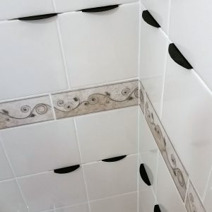 How to install a corner shower shelf