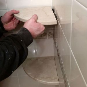 glue on corner shower shelf