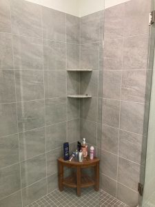 shower rack keeps falling